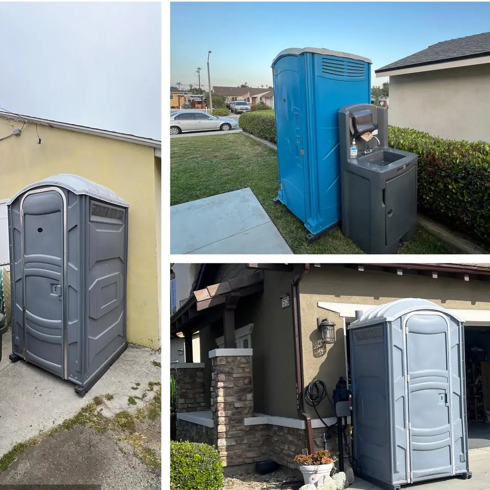 Porta potty and hand washing station beside a house